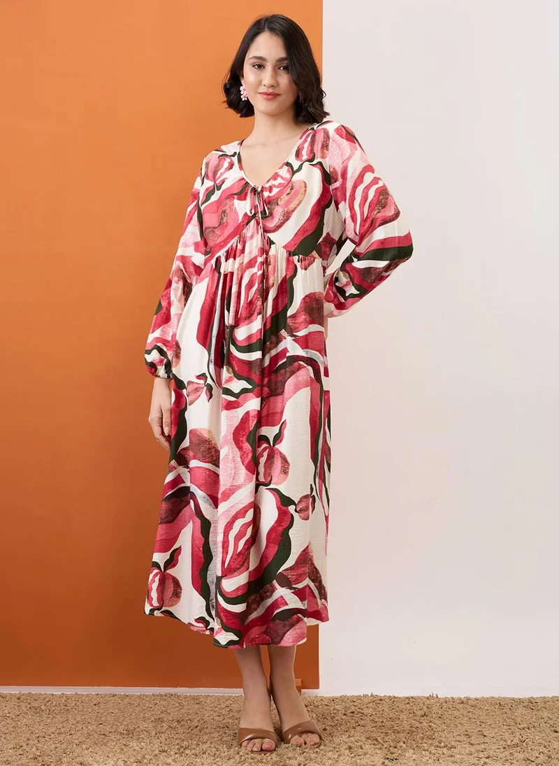 جلو باص فستان ميدي نسائي من جلوبس بطبعات تجريدية وأكمام أسقف وياقة على شكل حرف  وربطة عنق وتفاصيل مجمعة